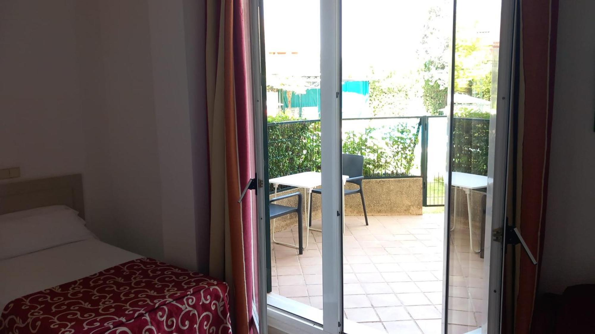 Hospedium Hotel Apartamentos Simon Verde Mairena del Aljarafe Bilik gambar