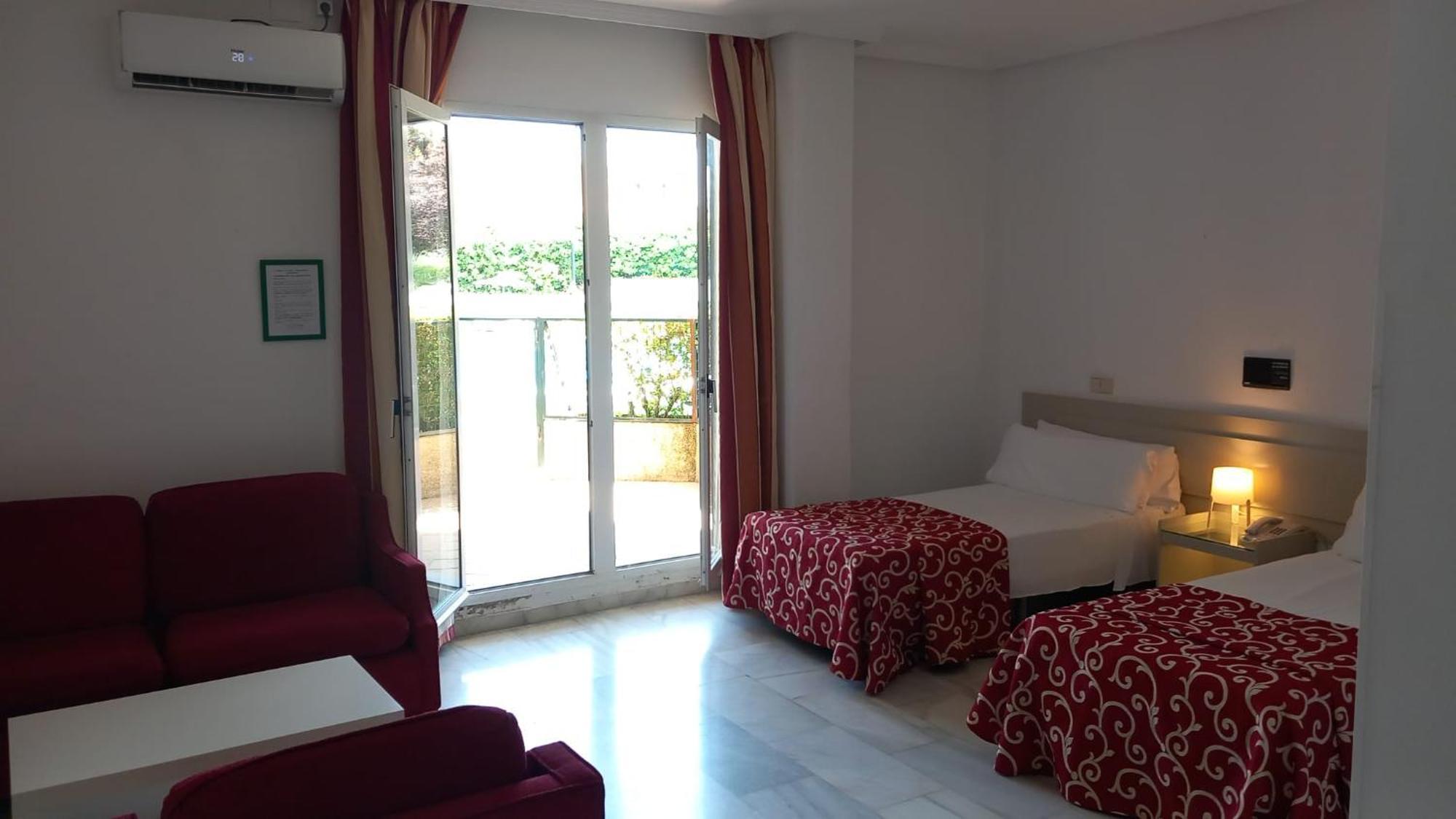 Hospedium Hotel Apartamentos Simon Verde Mairena del Aljarafe Bilik gambar